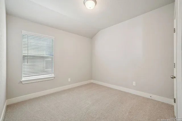 an empty room with a window