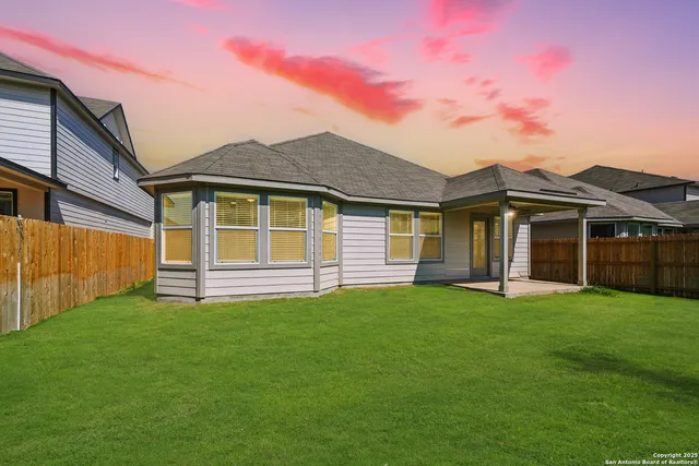 a view of a house with a garden