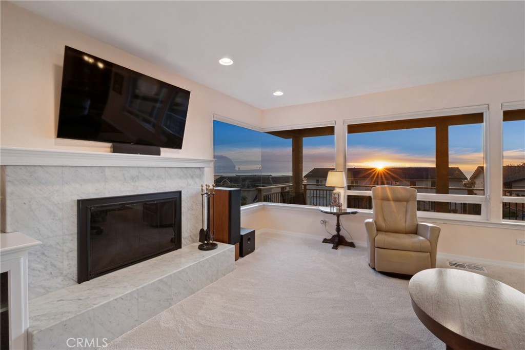 280 Kern Avenue Morro Bay, CA 93442 - Photo 11 of 54 a living room with furniture fireplace and flat screen tv
