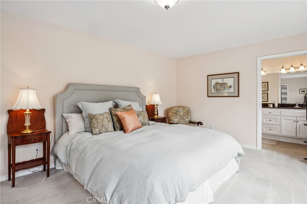 280 Kern Avenue Morro Bay, CA 93442 - Photo 27 of 54 a bedroom with a bed and a night stand