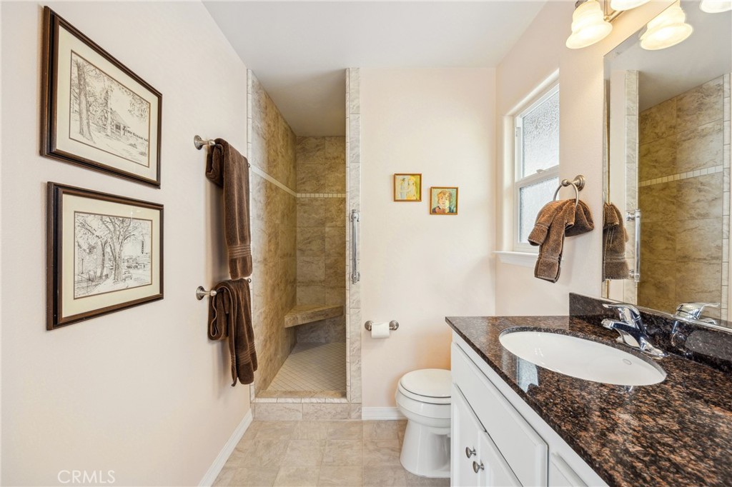 280 Kern Avenue Morro Bay, CA 93442 - Photo 29 of 54 a bathroom with a granite countertop sink toilet and shower