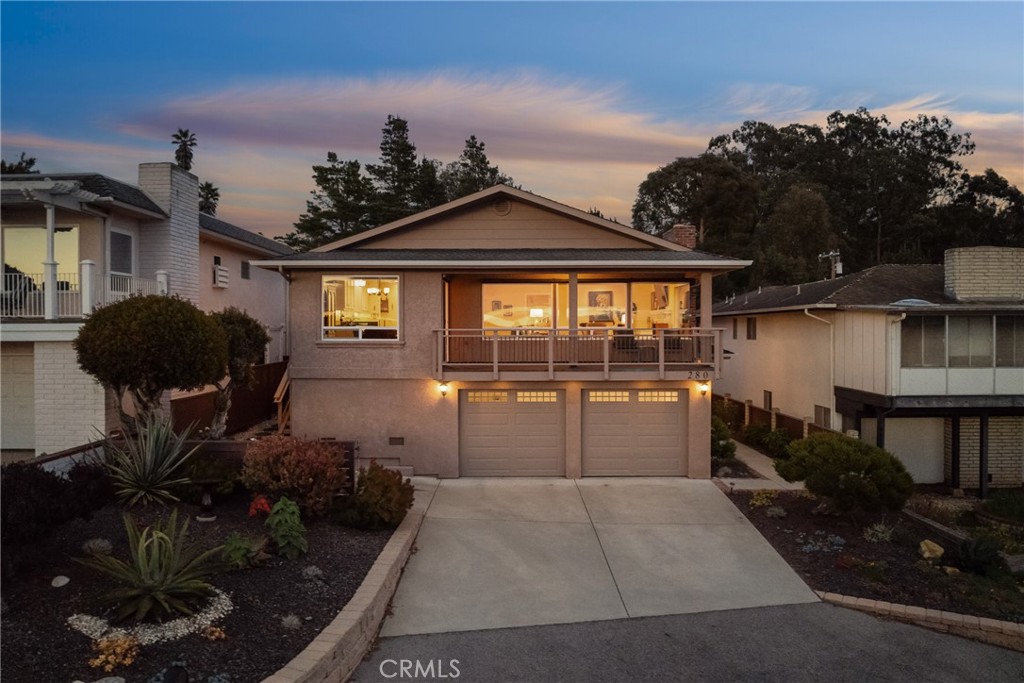 280 Kern Avenue Morro Bay, CA 93442 - Photo 3 of 54 a front view of a house with garden