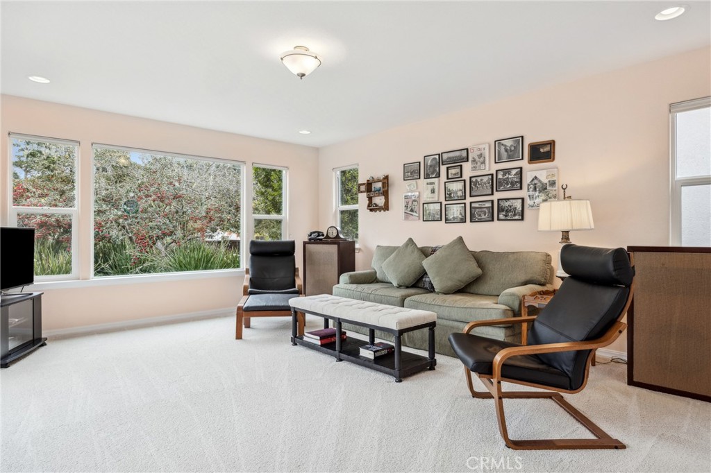 280 Kern Avenue Morro Bay, CA 93442 - Photo 36 of 54 a living room with furniture and a flat screen tv