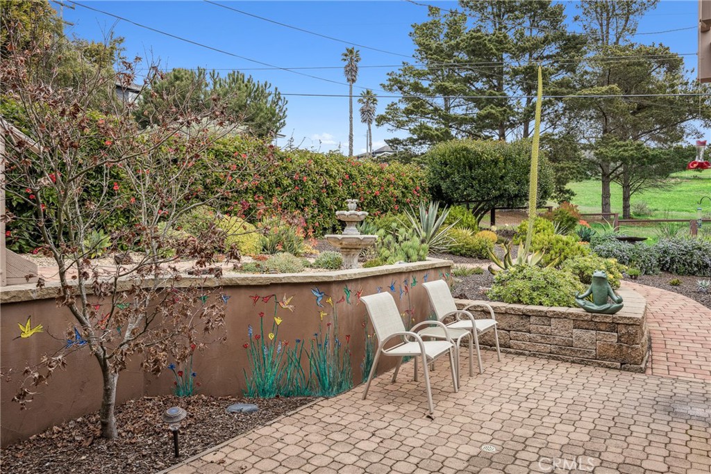 280 Kern Avenue Morro Bay, CA 93442 - Photo 40 of 54 a view of a chairs and table in a backyard