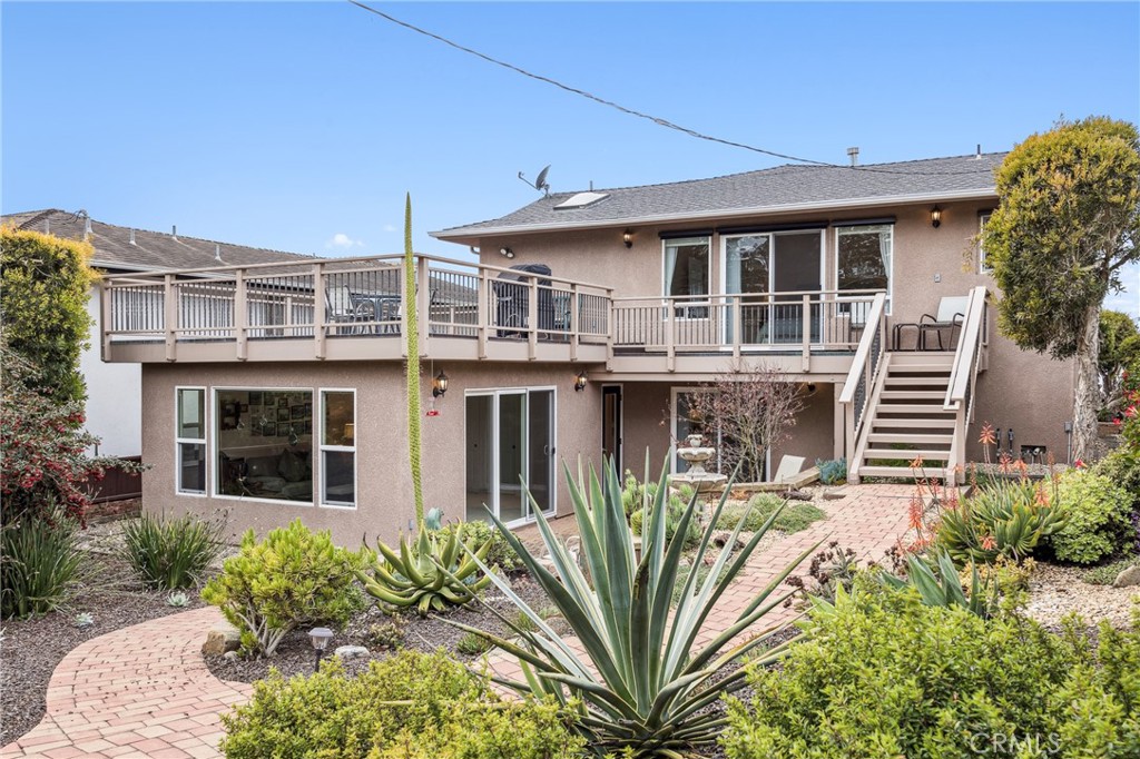 280 Kern Avenue Morro Bay, CA 93442 - Photo 42 of 54 a front view of a house with a garden