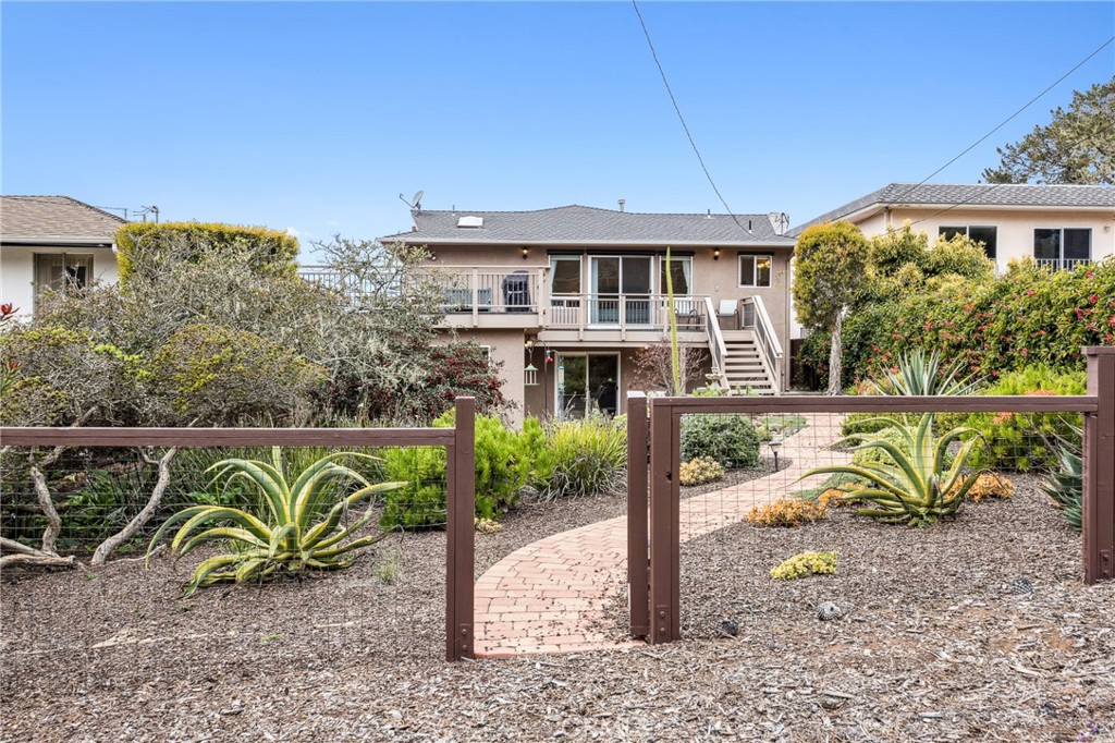 280 Kern Avenue Morro Bay, CA 93442 - Photo 43 of 54 a front view of a house with a garden
