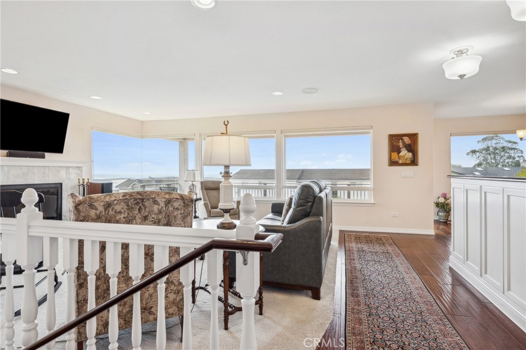 280 Kern Avenue Morro Bay, CA 93442 - Photo 7 of 54 a view of a living room a dining room with furniture window and wooden floor