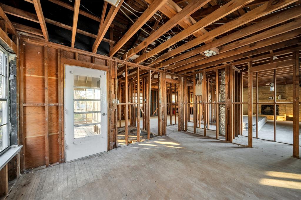 1026 Ridge Road Rockwall, TX 75087 - Photo 12 of 15 a view of an empty room with wooden walls