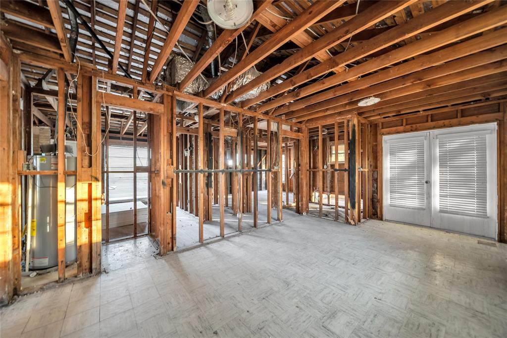 1026 Ridge Road Rockwall, TX 75087 - Photo 13 of 15 a view of an empty room with windows