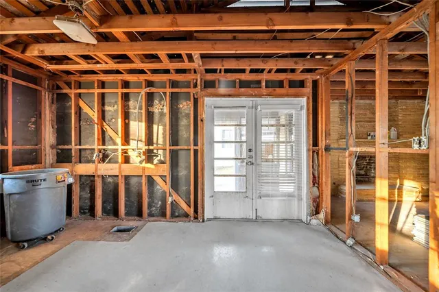 a view of a room with wooden walls