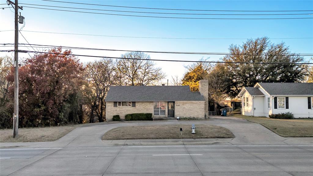 1026 Ridge Road Rockwall, TX 75087 - Photo 4 of 15 a house view with a outdoor space