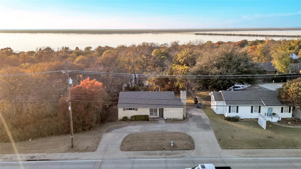 1026 Ridge Road Rockwall, TX 75087 - Photo 6 of 15 a view of a balcony with mountain view and wooden floor