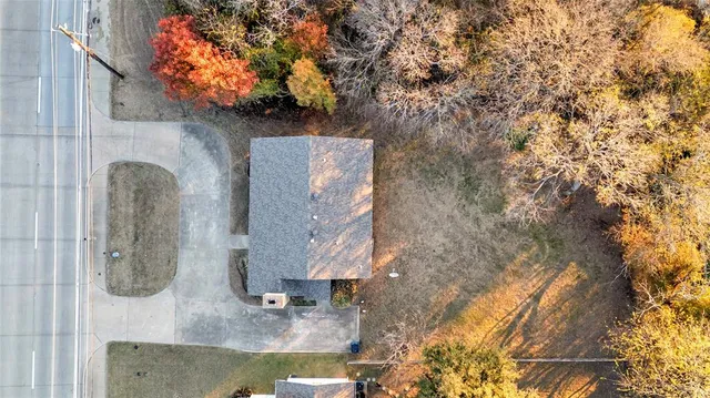 a brick house with a large windows