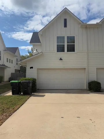 a view of storage and utility room with washer and dryer