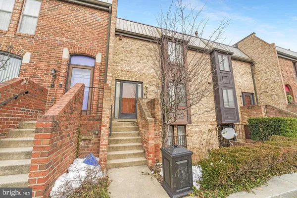 a view of a house with a street
