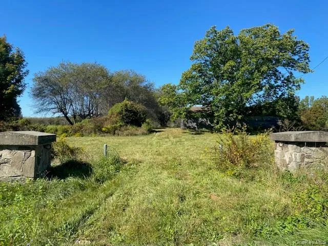 a view of lake with green space