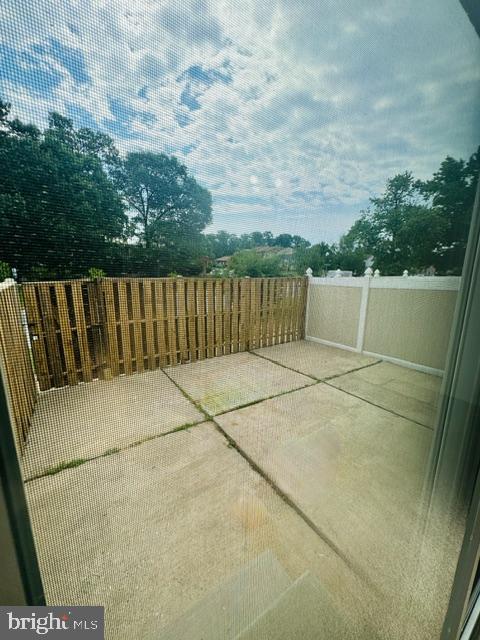 6 Ojibway Road Randallstown, MD 21133 - Photo 15 of 32 FENCED PATIO OFF THE LIVING ROOM