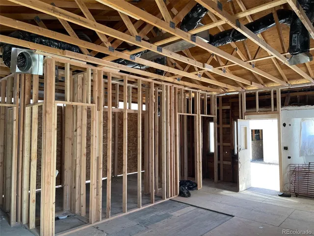 a view of a room with wooden walls