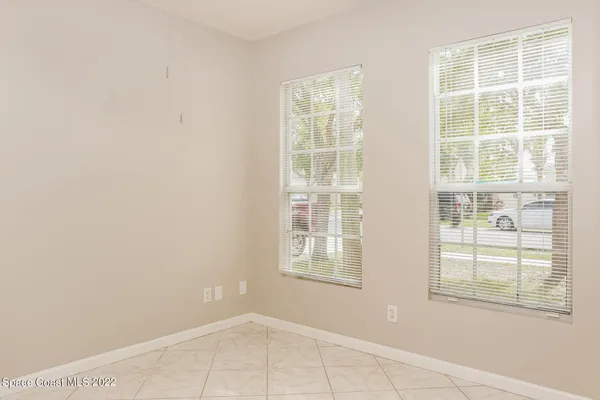 a bathroom with a sink a mirror and glass door