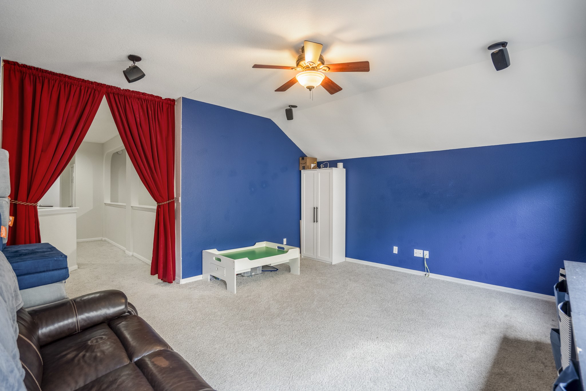 10410 Pitcataway Drive Spring, TX 77379 - Photo 22 of 48 The gameroom is large enough to accommodate several gaming area as well as plenty of space for sofas to realx and unwind.