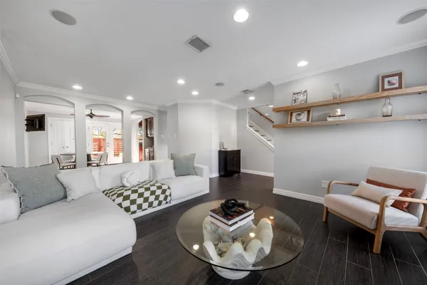 a kitchen with stainless steel appliances granite countertop wooden cabinets and sink