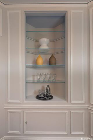 a kitchen with stainless steel appliances a sink a stove and a window