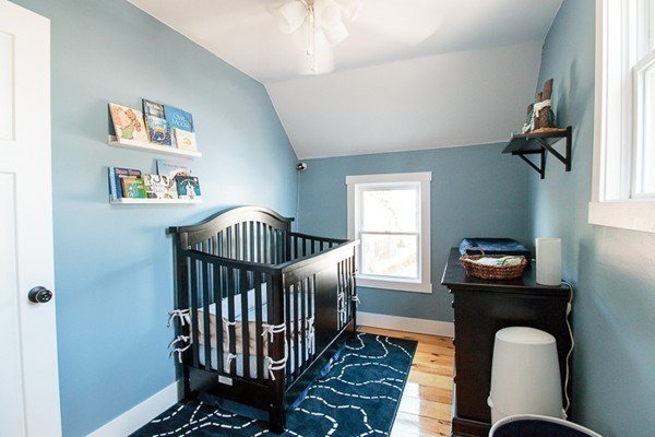 23 Massasoit Road Weymouth, MA 02191 - Photo 12 of 21 a bedroom with furniture and a window