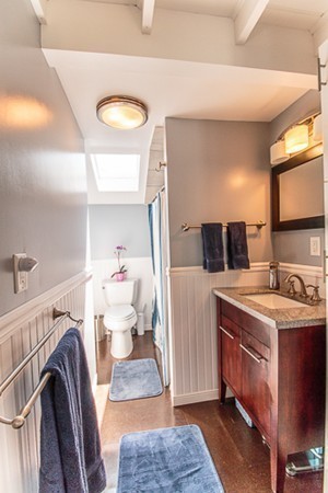 23 Massasoit Road Weymouth, MA 02191 - Photo 13 of 21 a bathroom with a sink mirror and toilet