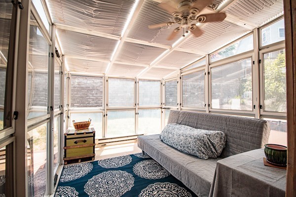 23 Massasoit Road Weymouth, MA 02191 - Photo 17 of 21 a bedroom with furniture and a large window