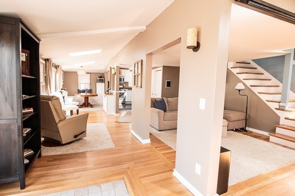 23 Massasoit Road Weymouth, MA 02191 - Photo 6 of 21 a living room with couches and kitchen view with wooden floor