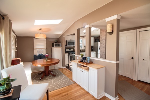 23 Massasoit Road Weymouth, MA 02191 - Photo 7 of 21 a living room with furniture and a table
