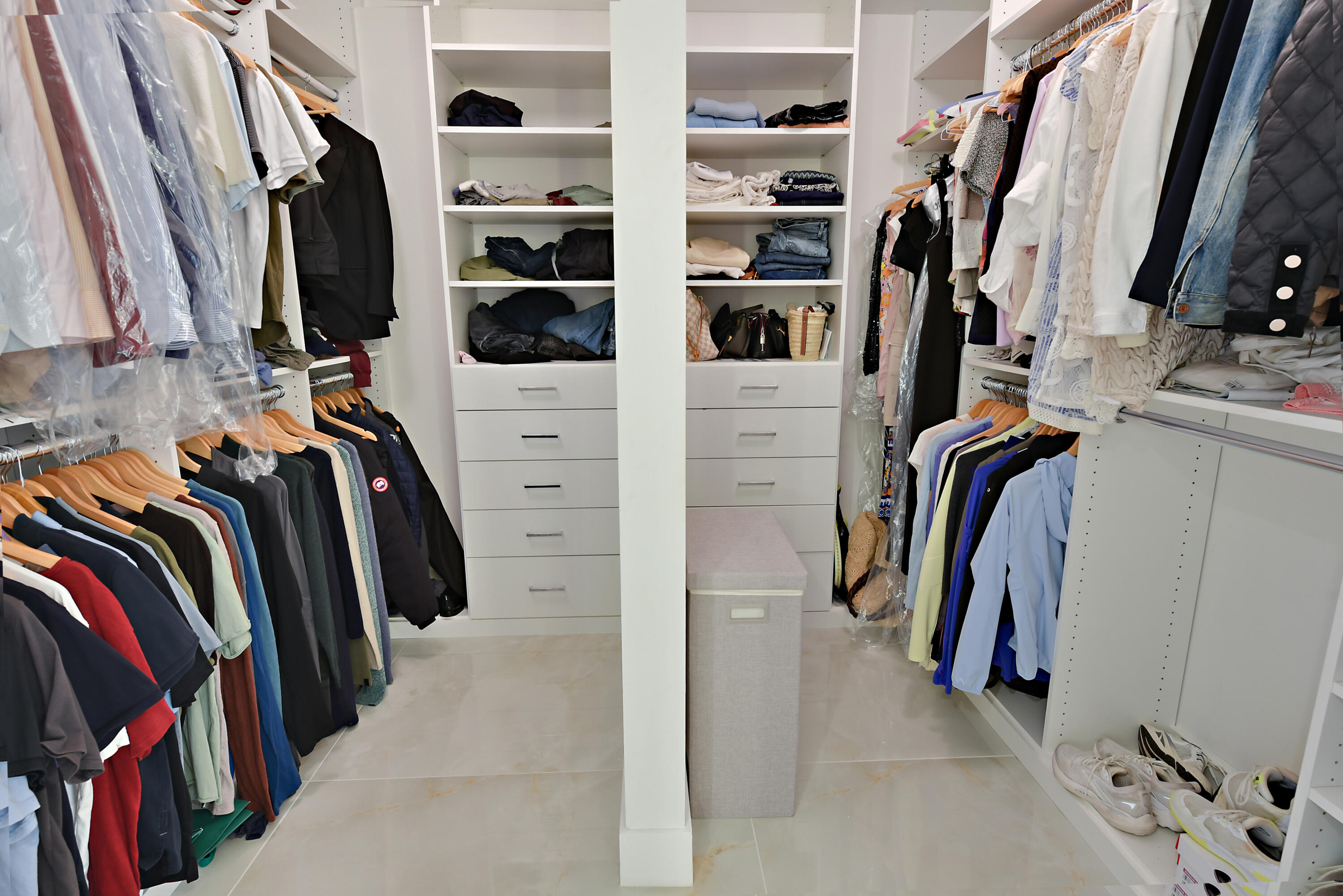 485 East Royal Palm Road, Unit 403 Boca Raton, FL 33432 - Photo 19 of 74 a view of walk in closet with clothes and shoes