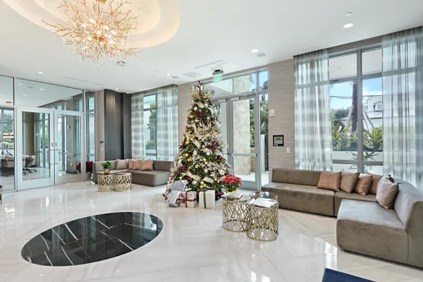 a view of a porch with potted plants