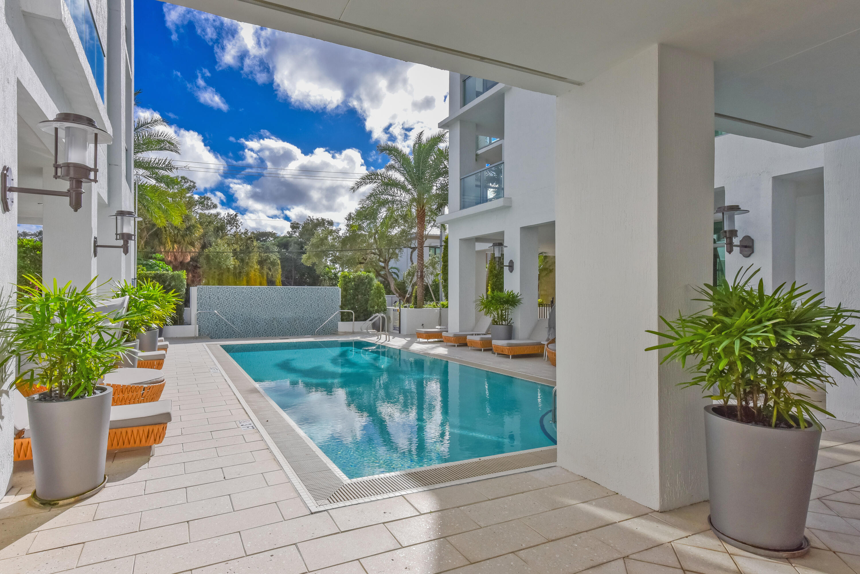 485 East Royal Palm Road, Unit 403 Boca Raton, FL 33432 - Photo 35 of 74 a view of a porch with potted plants