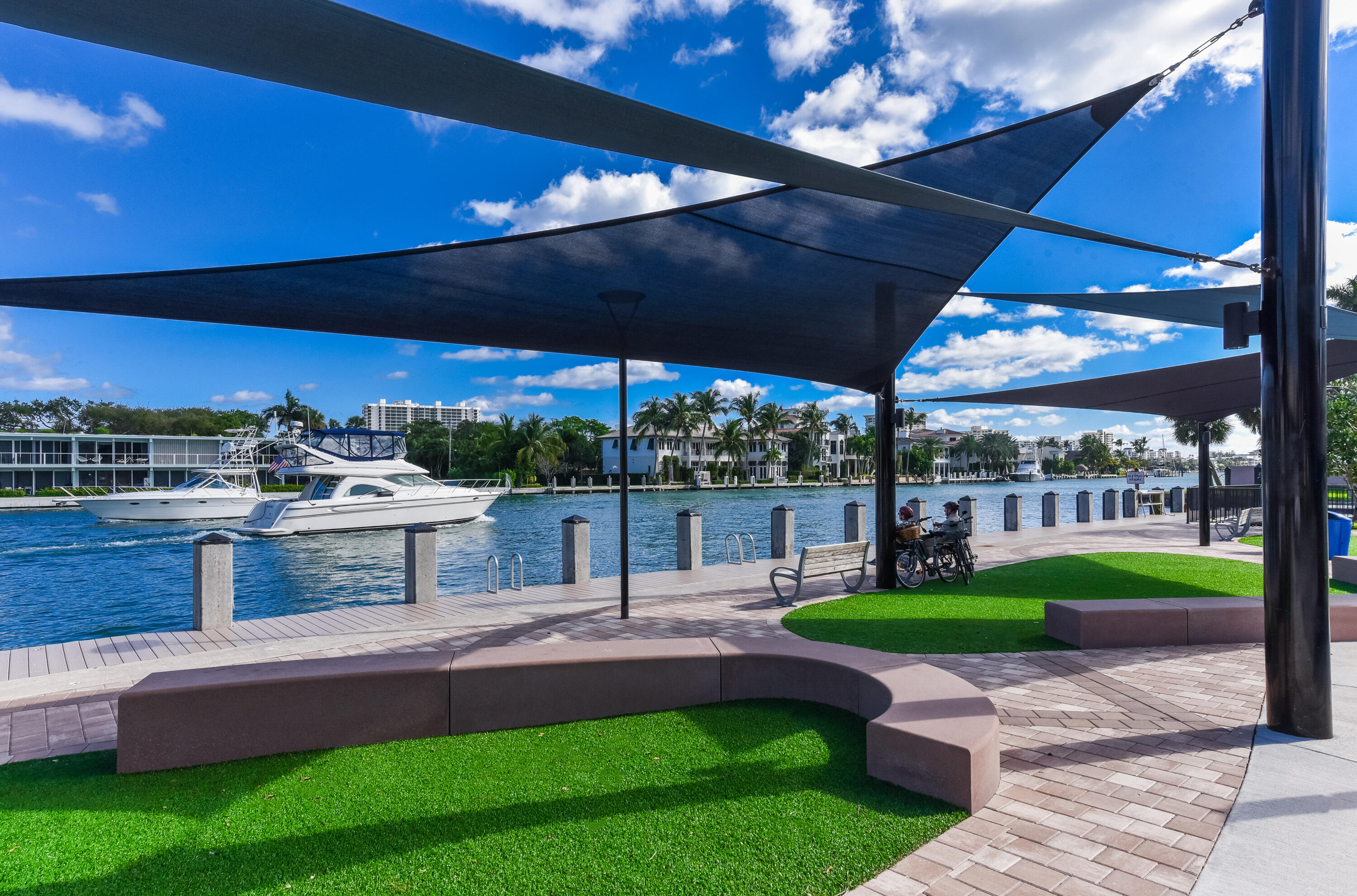 485 East Royal Palm Road, Unit 403 Boca Raton, FL 33432 - Photo 46 of 74 a view of a patio with a table chairs potted plants and a yard