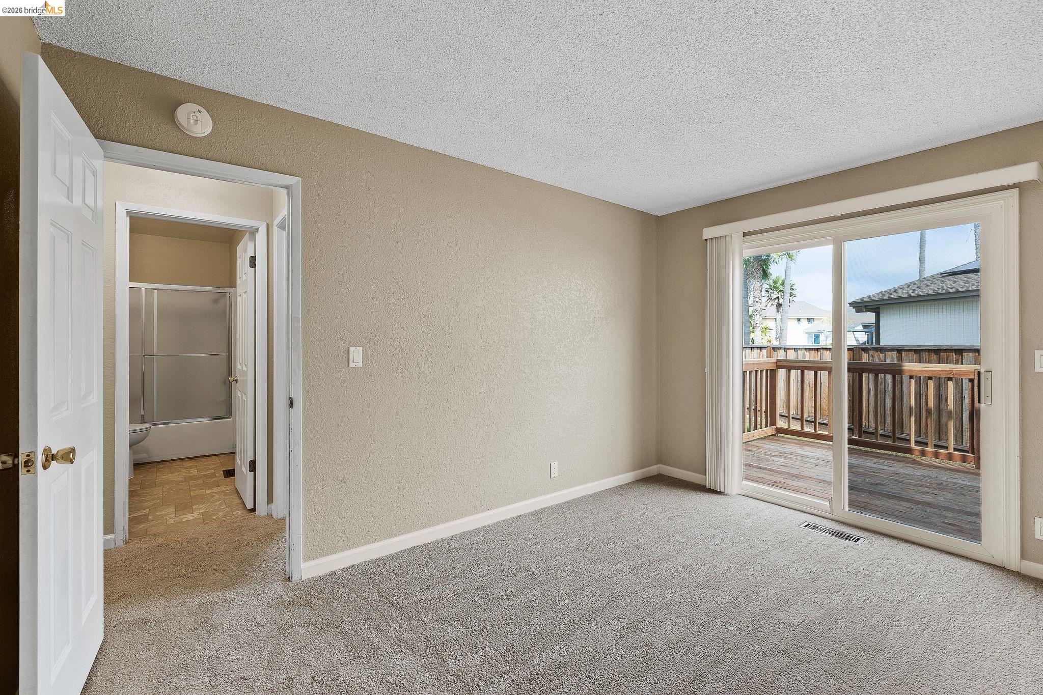 1147 Willow Lake Road Discovery Bay, CA 94505 - Photo 12 of 59 an empty room with windows and closet