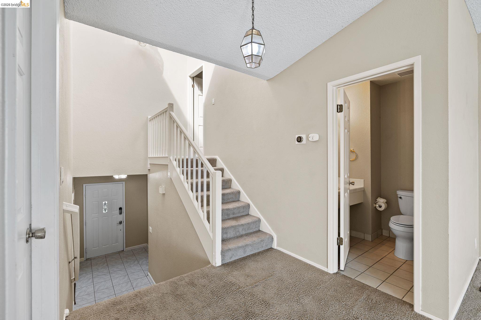 1147 Willow Lake Road Discovery Bay, CA 94505 - Photo 28 of 59 a view of a hallway view with staircase