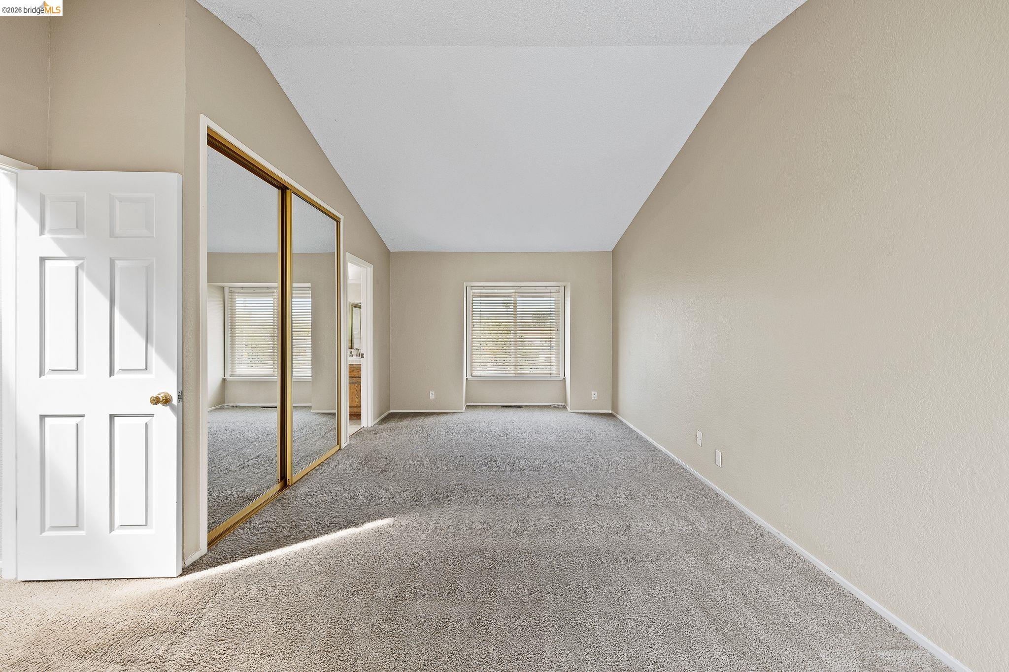 1147 Willow Lake Road Discovery Bay, CA 94505 - Photo 31 of 59 a view of a big room with closet and windows