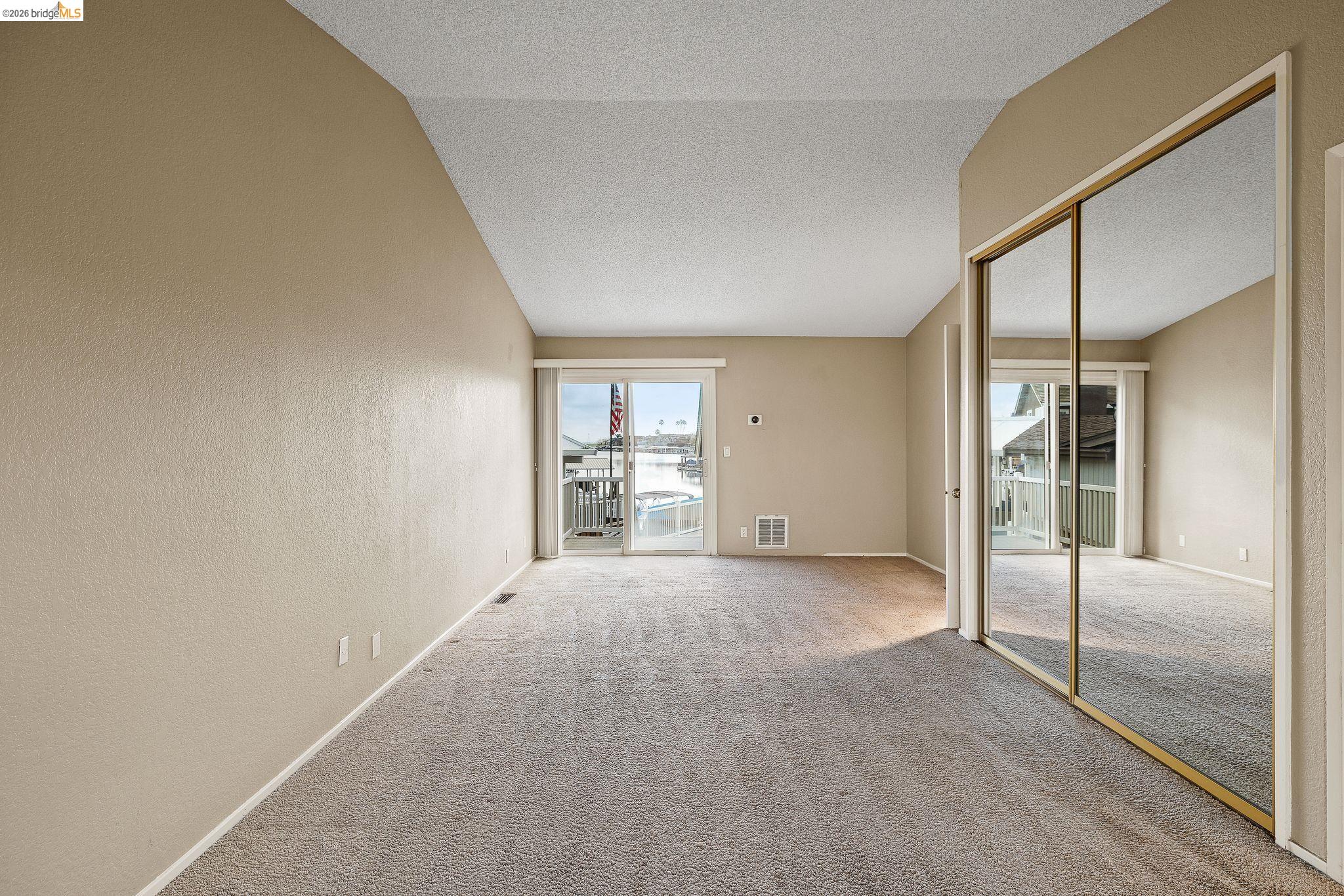 1147 Willow Lake Road Discovery Bay, CA 94505 - Photo 35 of 59 Unfurnished room featuring light carpet and baseboards