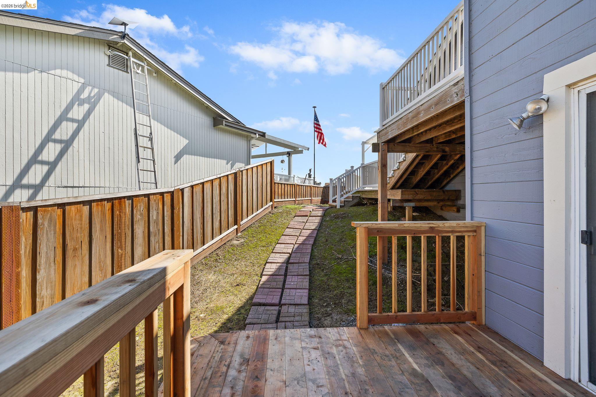 1147 Willow Lake Road Discovery Bay, CA 94505 - Photo 48 of 59 a view of deck with wooden floor and metal railing