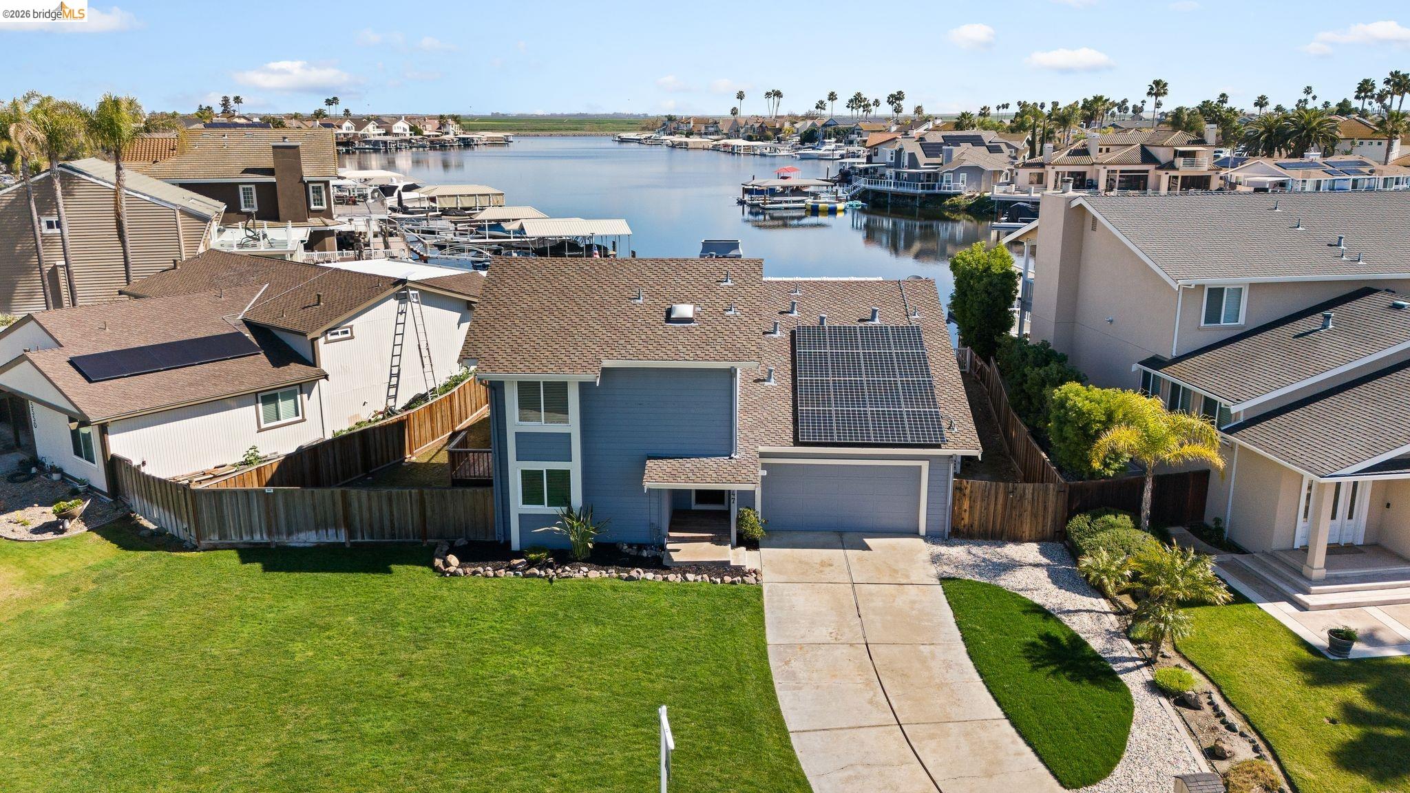 1147 Willow Lake Road Discovery Bay, CA 94505 - Photo 53 of 59 an aerial view of a house with a garden and plants