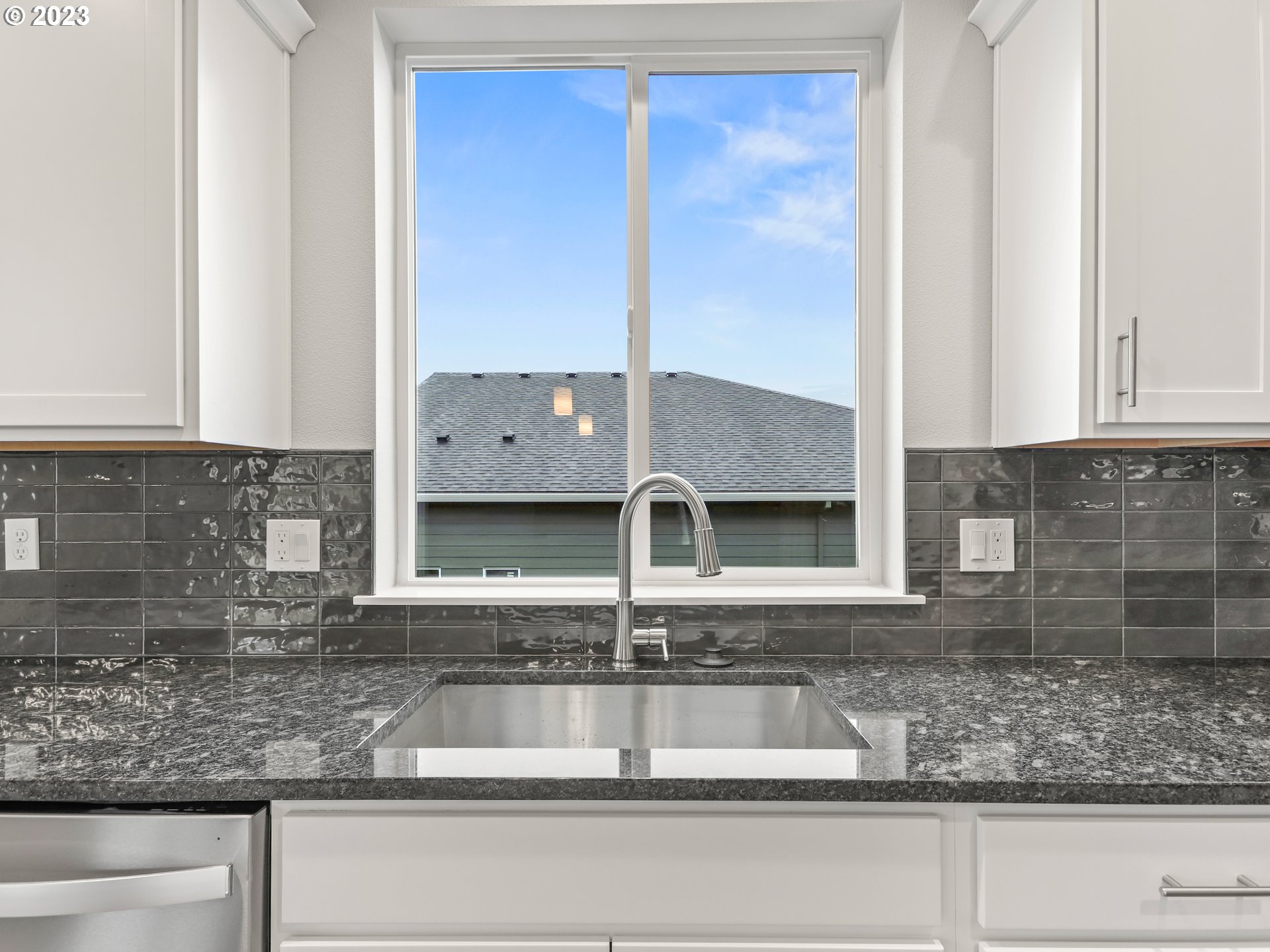 652 Northeast Pinebreak Drive Estacada, OR 97023 - Photo 12 of 40 a kitchen with a sink and cabinets