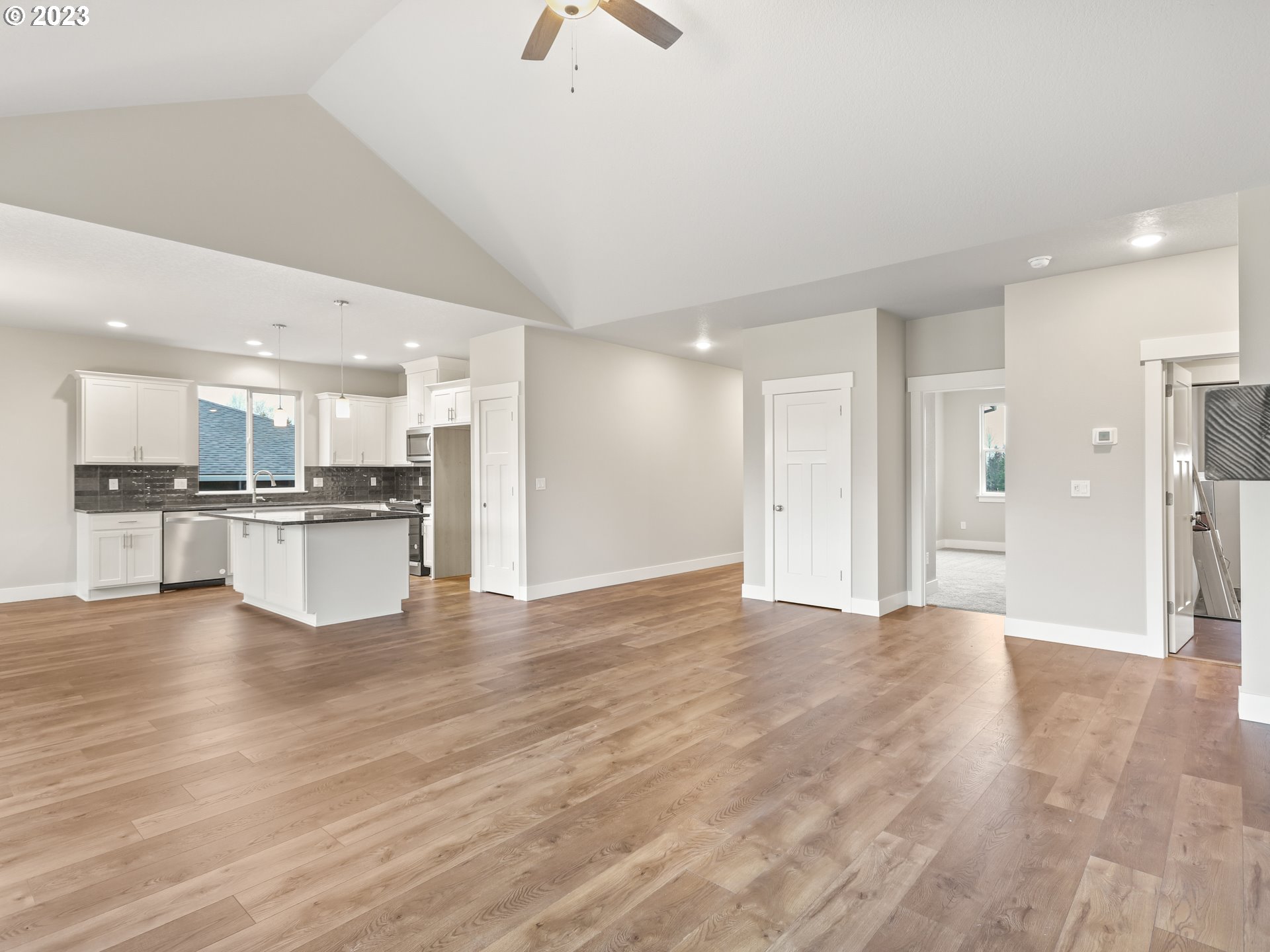 652 Northeast Pinebreak Drive Estacada, OR 97023 - Photo 20 of 40 a view of kitchen with refrigerator and window