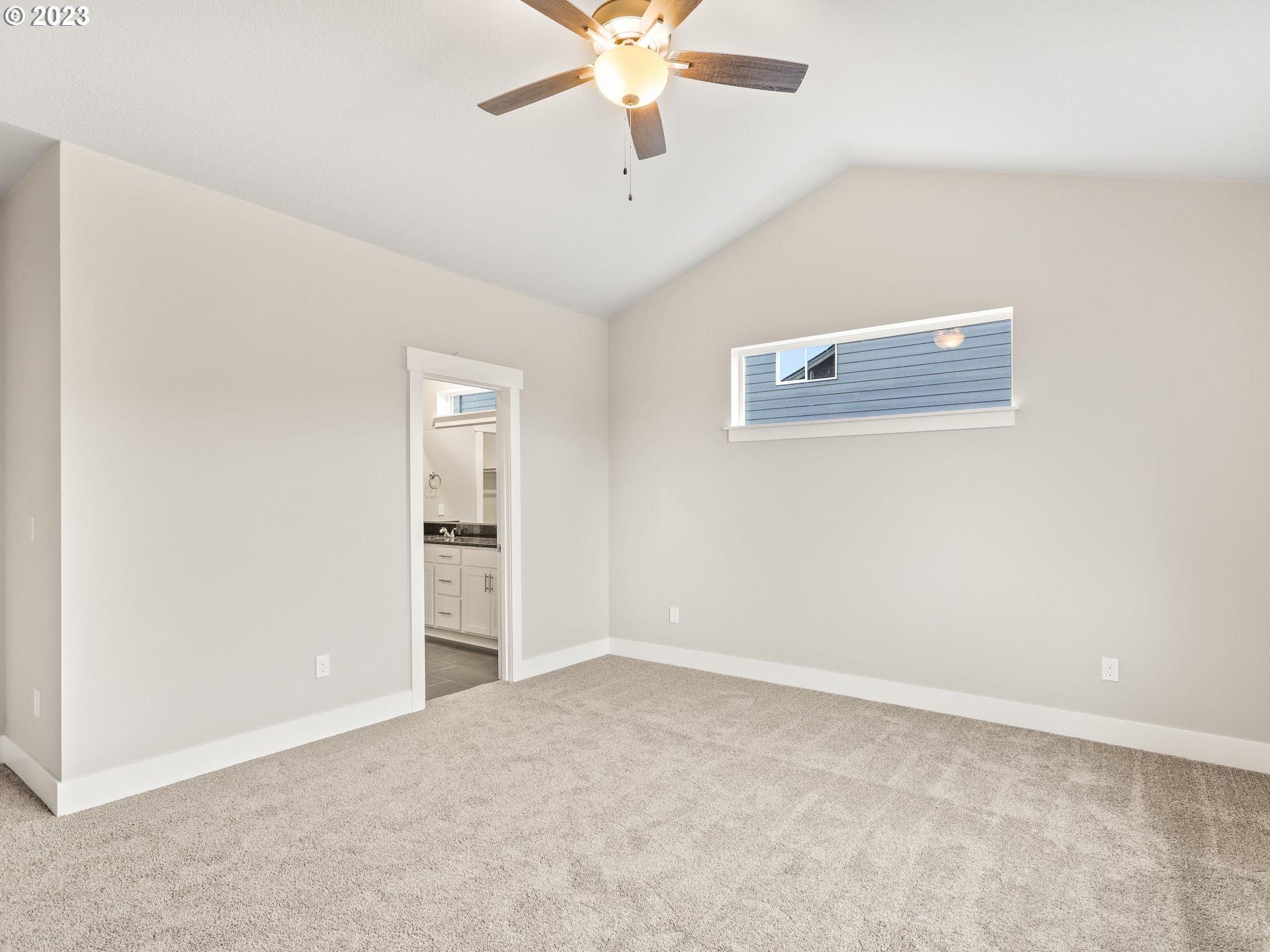 652 Northeast Pinebreak Drive Estacada, OR 97023 - Photo 28 of 40 an empty room with closet and windows