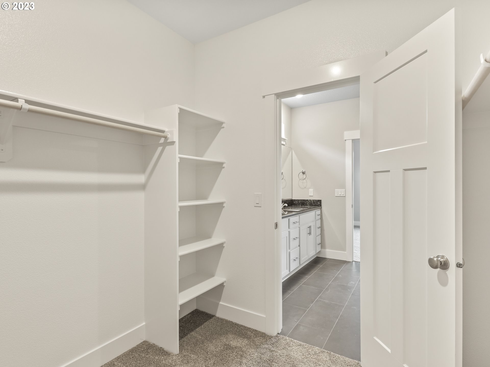 652 Northeast Pinebreak Drive Estacada, OR 97023 - Photo 33 of 40 a view of walk in closet with empty racks