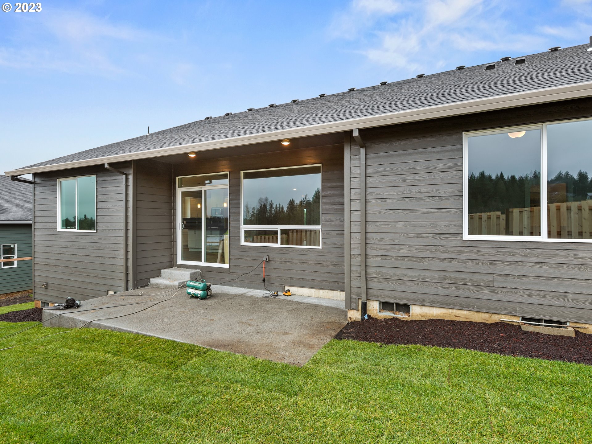 652 Northeast Pinebreak Drive Estacada, OR 97023 - Photo 36 of 40 a front view of a house with a yard and porch