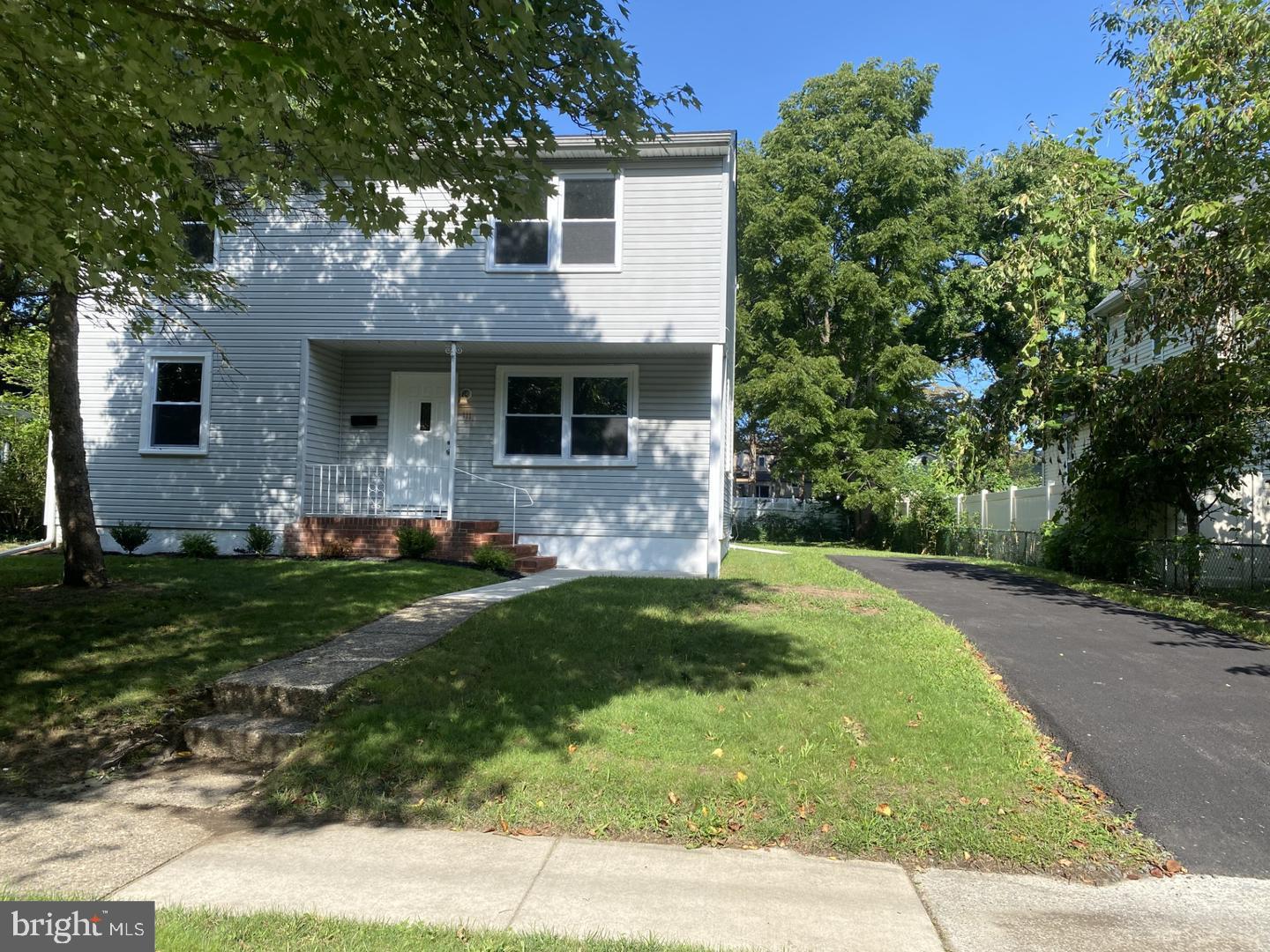 111 Edison Road Cherry Hill, NJ 08034 - Photo 3 of 8 a front view of a house with garden