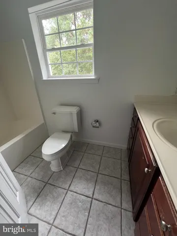 a bathroom with a toilet