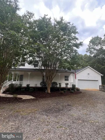 a view of house with a outdoor space