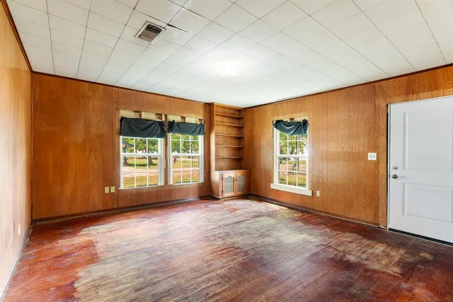 an empty room with windows